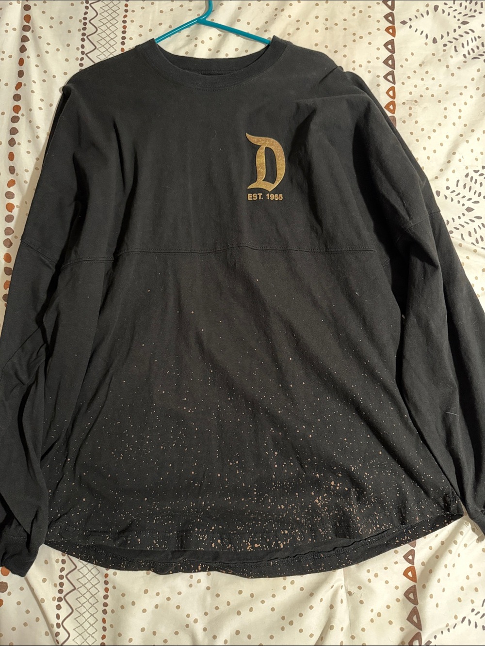 Black Sweatshirt with Gold 'D' Logo